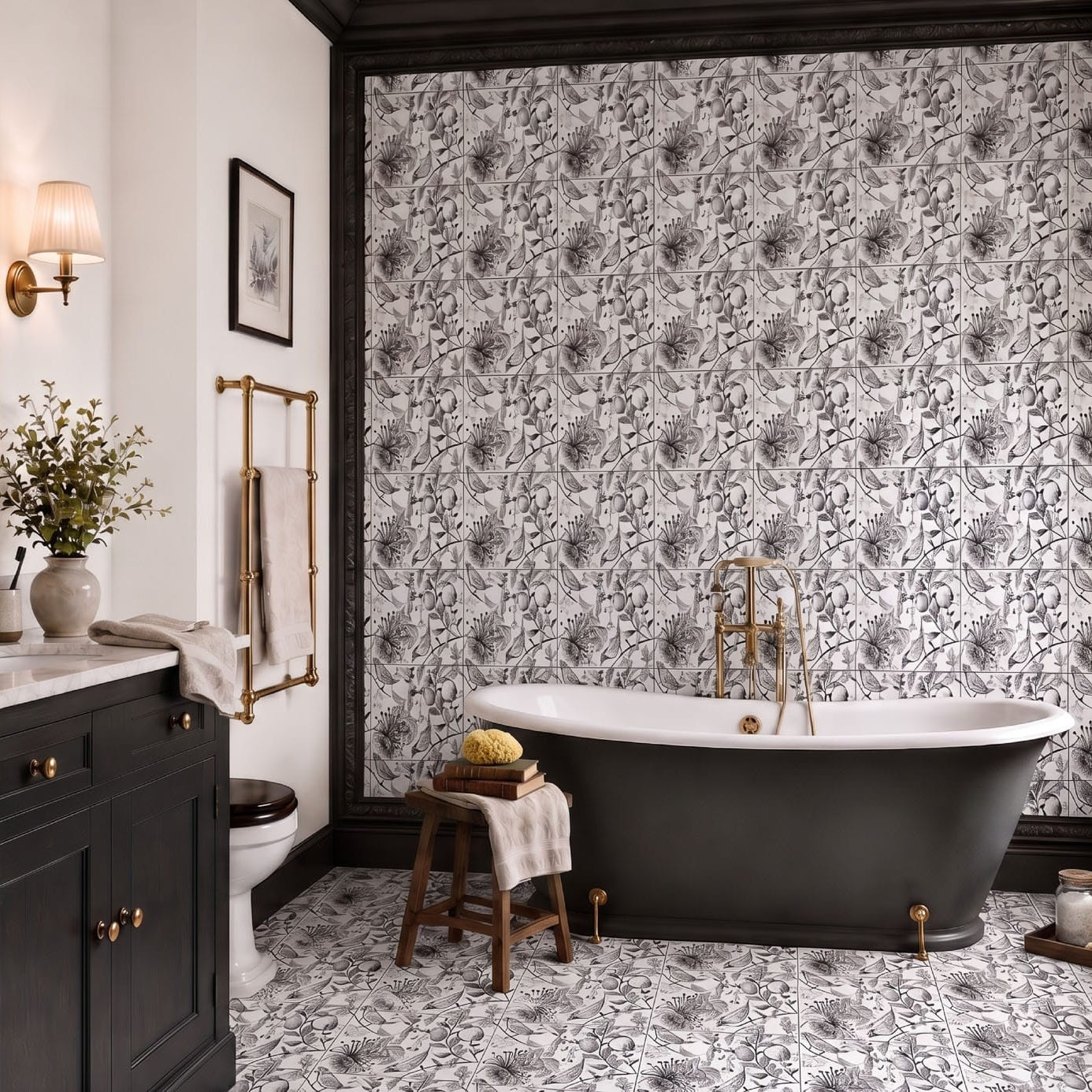 Heritage bathroom with Bird of Space black and white botanical bird ceramic tiles on the wall and floor, charcoal joinery, marble-top vanity, brass tapware and a freestanding roll-top bath.