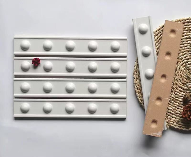 Decorative Raised Dots White Satin 50x300mm Border Tile