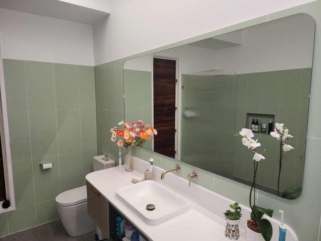 Bright & Beautiful: Bathroom Renovation Spotlight on Spring Green Tiles