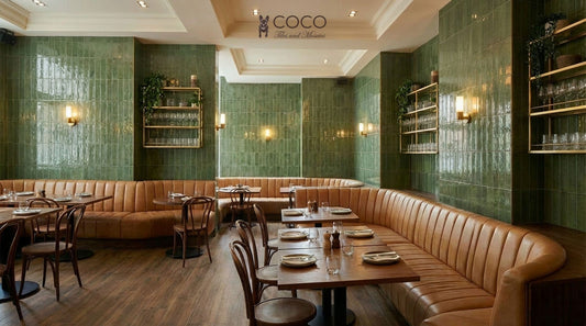 Brasserie-style restaurant with Coastline Boardwalk Cypress gloss 400x800 green porcelain wall tiles and Grandeur Autumn Arbour matt 200x1200 timber-look porcelain floor tiles.