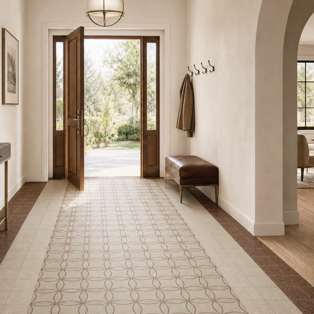 Warm entryway with Vogue Rosso Lacca Gloss 200x200 terracotta border tiles, Vogue Sabbia Matt 200x200 beige field tiles and Astro Sabbia Matt 200x200 patterned centre runner.