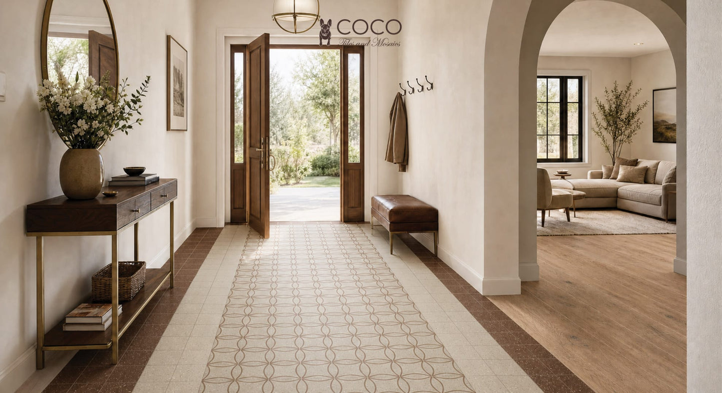 Warm entryway with Vogue Rosso Lacca Gloss 200x200 terracotta border tiles, Vogue Sabbia Matt 200x200 beige field tiles and Astro Sabbia Matt 200x200 patterned centre runner.
