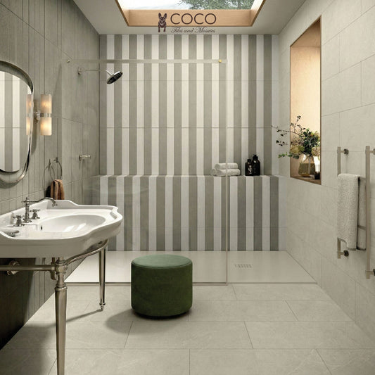 Coastal Hampton bathroom featuring Tides in Soft Motion with Driftboard Shore striped wall tiles and Formanta Libra matte floor tiles.
