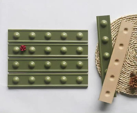 Decorative Raised Dots Sage Satin 50x300mm Border Tile