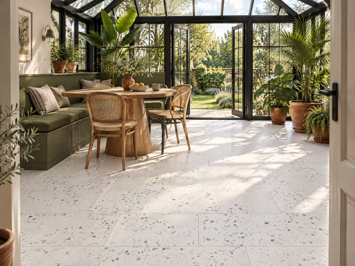 Awakening terrazzo-look tile in a orangery breakfast room