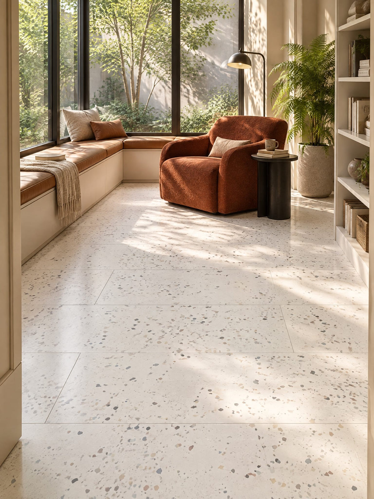 Awakening terrazzo-look tile in a reading sunroom