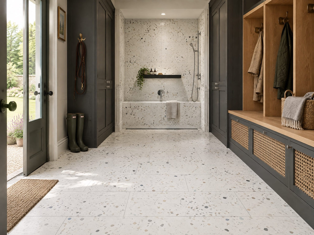 Awakening terrazzo-look tile in a mudroom pet wash