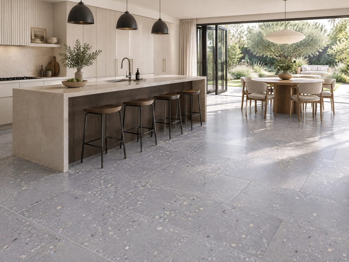 Cloudy terrazzo-look tile in an open kitchen and dining room